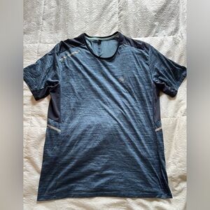 Women’s blue decathlon Performance T shirt size medium